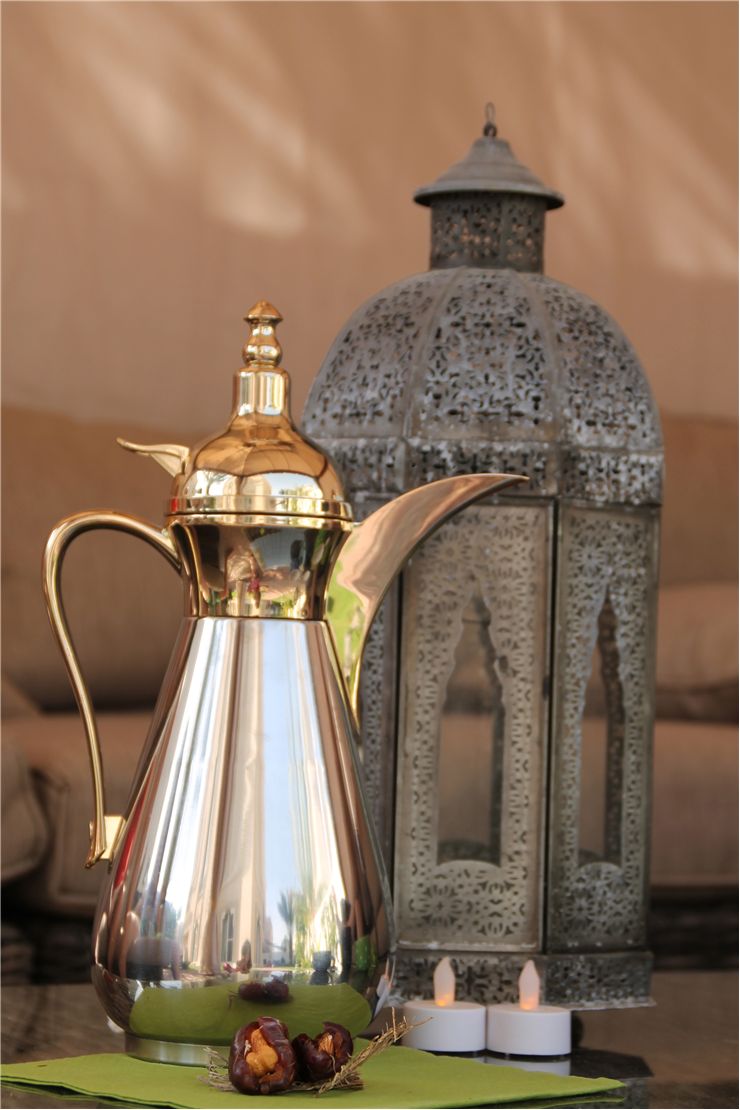 Picture Of Arabic Coffee In A Traditional Dallah With Dates