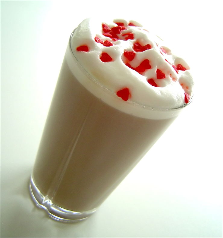 Picture Of Cafe Latte With Cream And Red Hearts