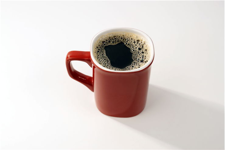 Picture Of Red Ceramic Coffee Mug With Black Coffee